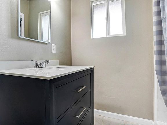 Inside on the private bathroom. Standing shower. Toilet not pictured.