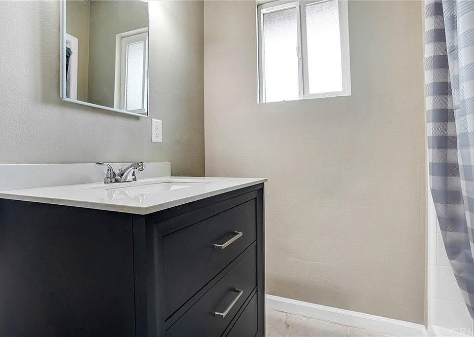 Inside on the private bathroom. Standing shower. Toilet not pictured.