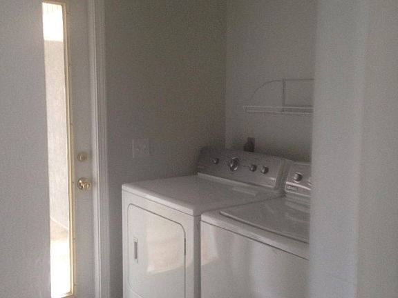 Entrance from Carport - Washer/Dryer