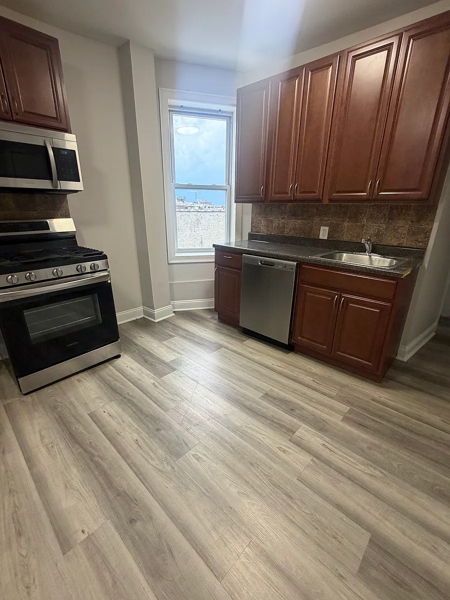 Building Photo - 6119 Park Ave #2E