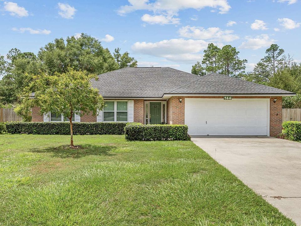 1st image of 144 SW Pine Forest Ct