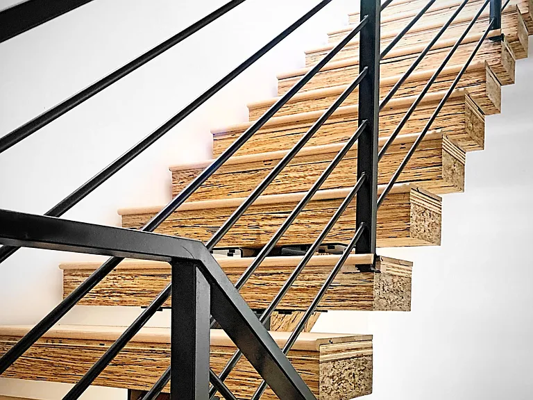 Floating stairs. Great for natural light filtering through the unit