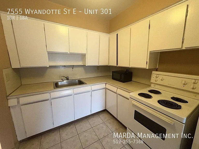 7555 Wyandotte St E #301 — Photo 26