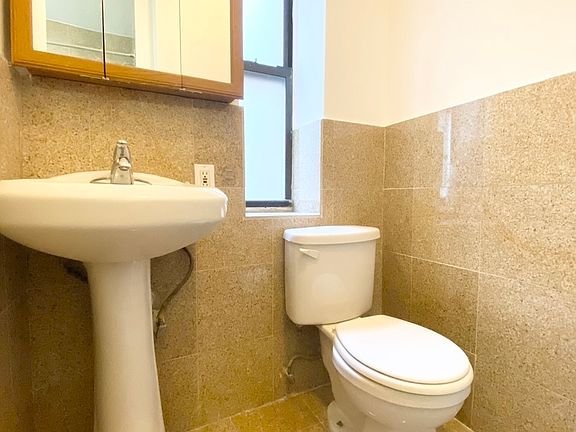 5th image of 348 E 66th St APT 11