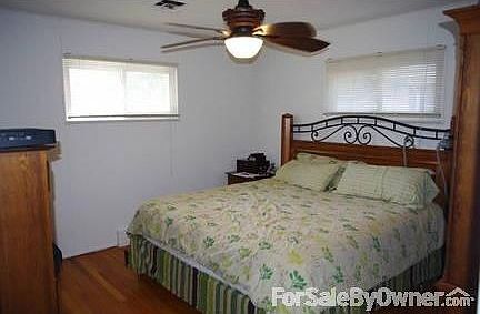 Master Bedroom
						:
						That's a king-sized bed and two end tables and room for more.