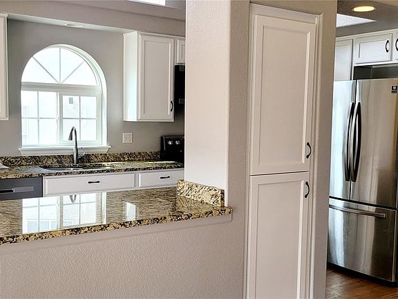 3rd image of 20308 E 48th Dr