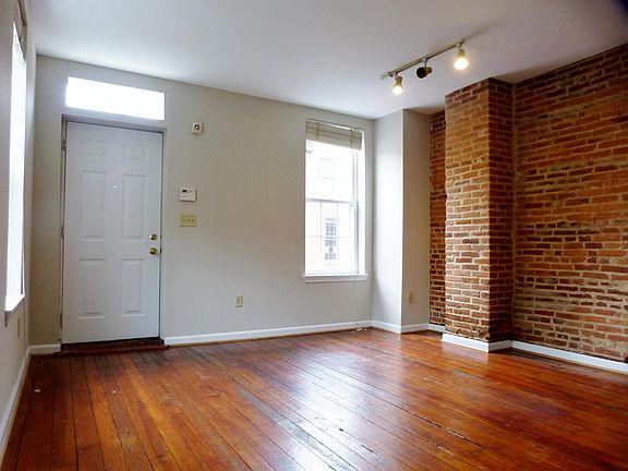 Open 1st Floor w/ Lots of Windows & Exposed Brick!