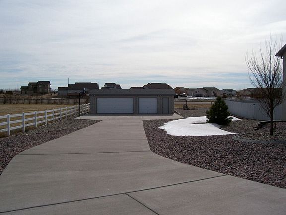 View of 3-car detached garage from front