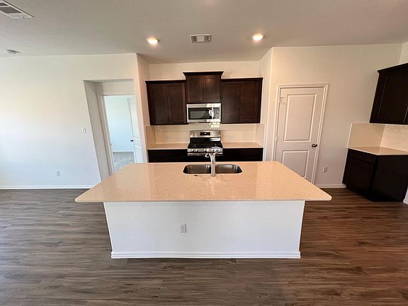 Features many stylish modern cabinets, new appliances, gourmet kitchen.
