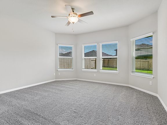 Enjoy plenty of natural lighting in the primary bedroom.