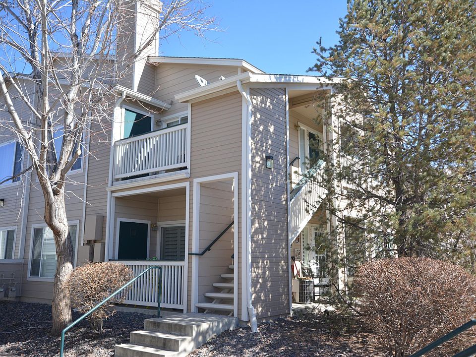 Condo is on the second floor with the detached garage nearby