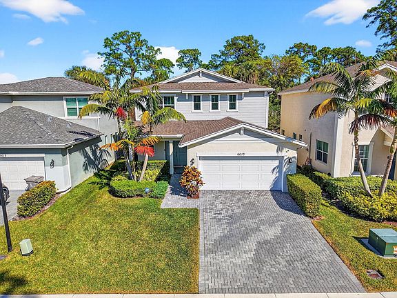 3rd image of 6613 Pointe Of Woods Drive