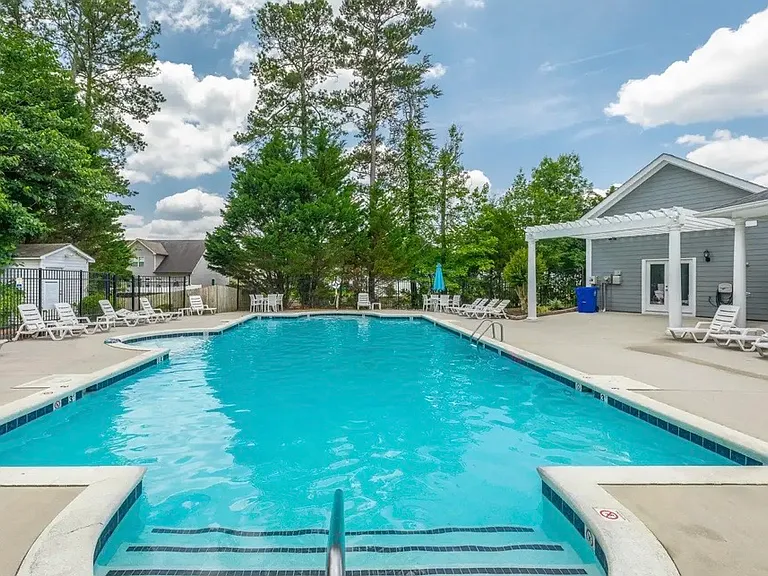 Gated pool area for privacy and safety. Two pool keys come with this property.