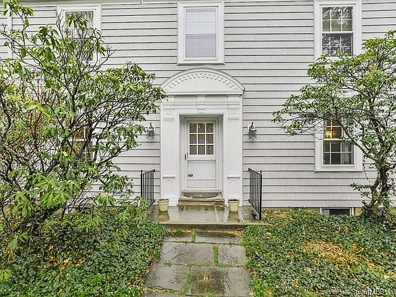Elegant carved woodwork surrounds your front door and is found throughout the house.