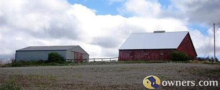 View of barn and machine shed