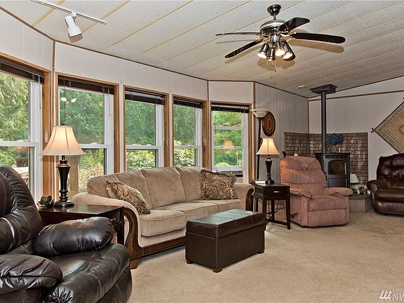 Not only will you have electric forced air heat, there's also a pellet stove in the corner if you prefer some wintertime ambience.  Plus, the house is sporting new padding and carpet just installed in July 2019.