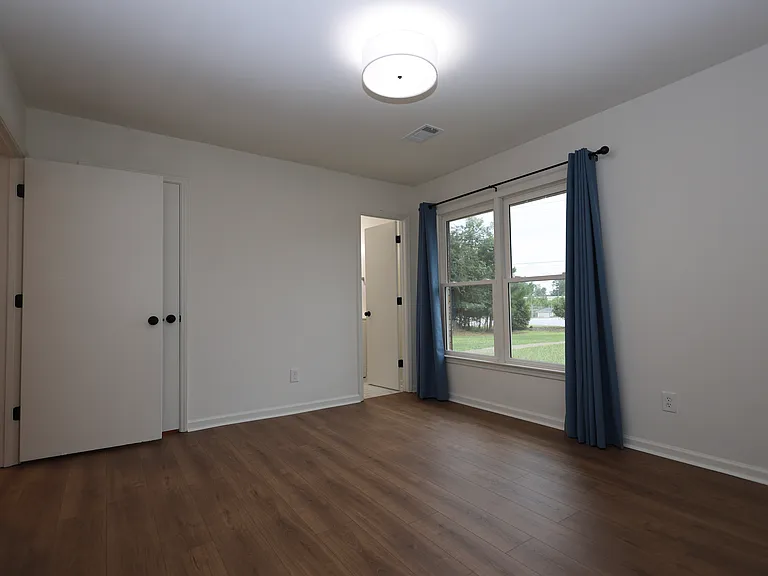 Master Bedroom with attached bath! New Flooring Throughout!