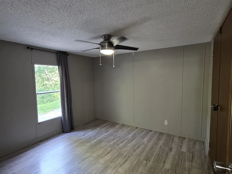 Larger of the 2 bedrooms.