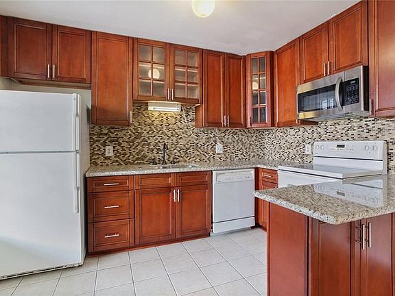 5th image of 7522 Benjamin St APT 212