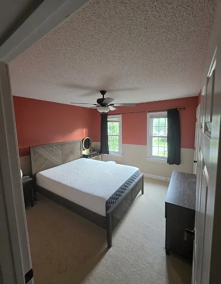Labeled as "Bedroom 2" in the second-floor floor plan. Comes with all furniture seen in the photo