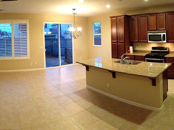 Wide view of kitchen/living room