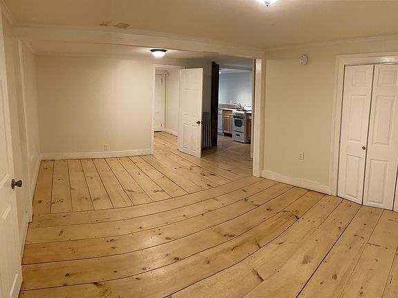 Living room with closet.