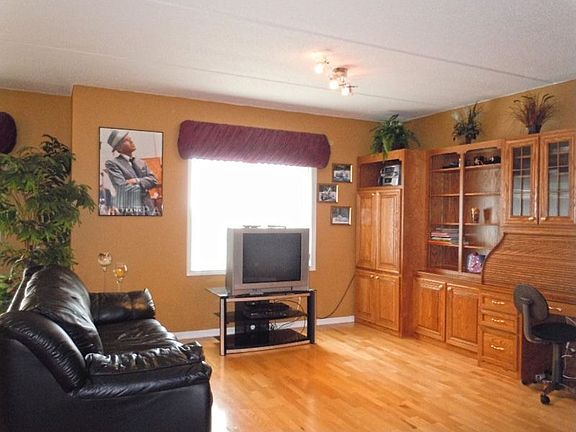 Spacious Living Room with Hardwood Floors