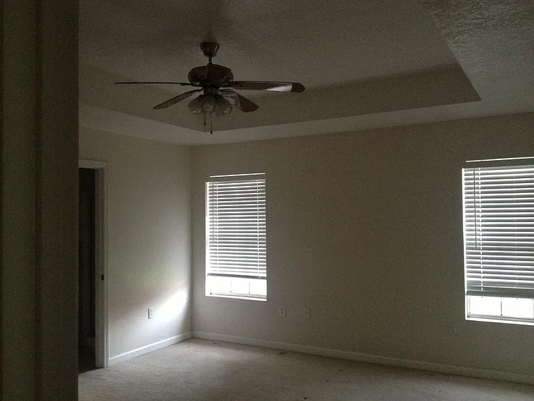 Mast bedroom with bathroom and 2 walk-in closets.