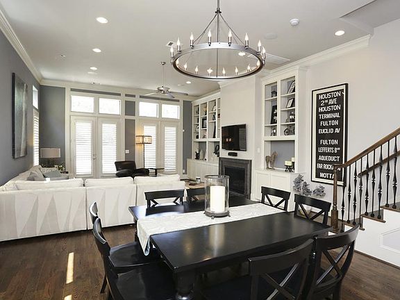 Open to the living area, this graceful dining room creates the perfect setting for entertaining. Ext