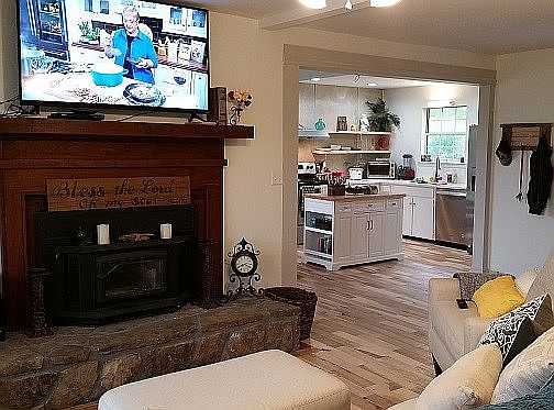 living room opens to kitchen