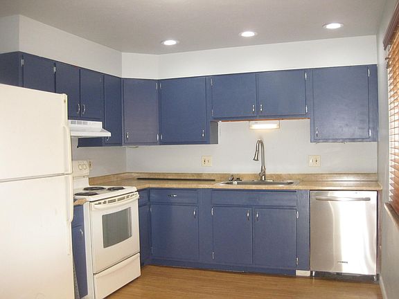 Full kitchen with dishwasher.