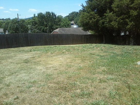 Large fenced in lot.