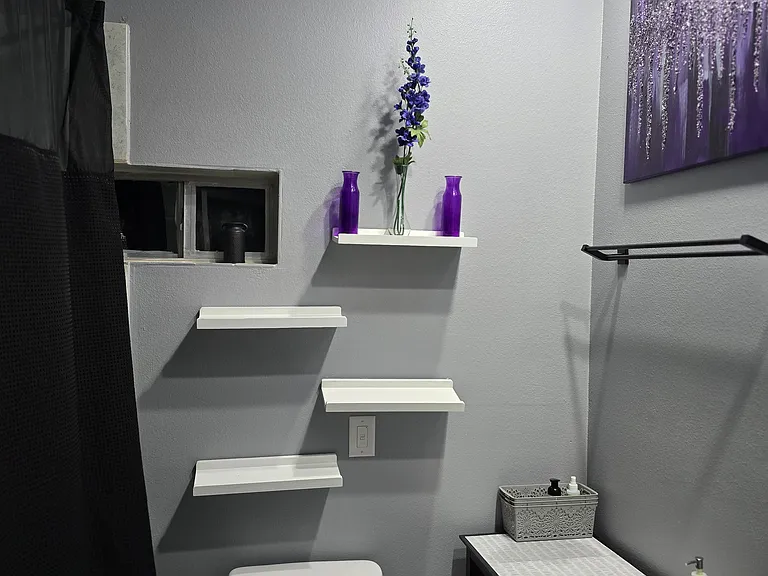 Bathroom between king and queen rooms. Large with closet