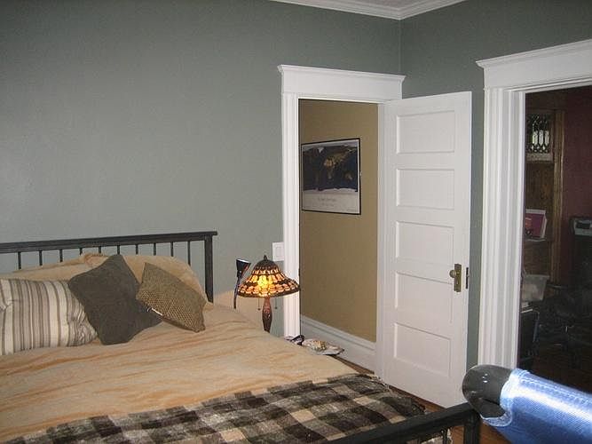 Bedroom1 is off the dining room and features crown molding and a deep closet