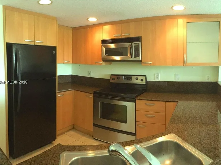201 Golden Isles Dr #409 — Photo 14