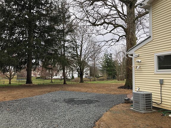 Private driveway (will be paved) abuts other houses to rear