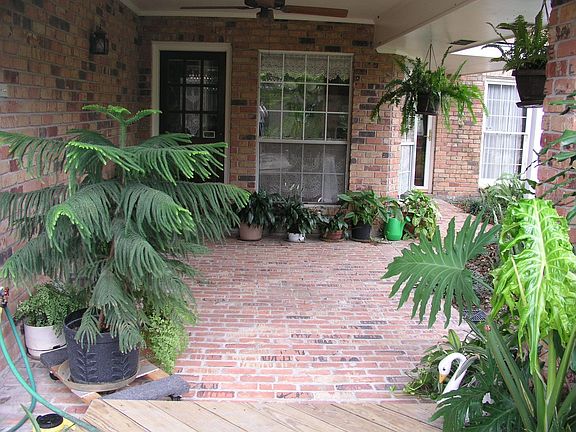 REAR COVERED BRICK PATIO