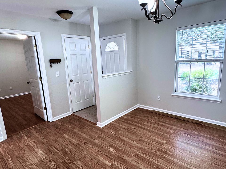 Formal dining room off the entry way, leads into the galley kitchen.
