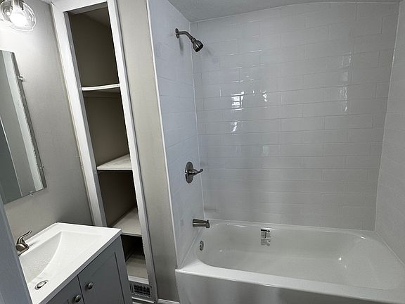 Fully remodeled bath with subway tile surround
