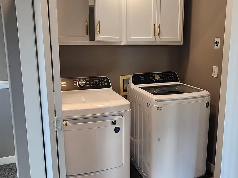Laundry upstairs with new washer & dryer