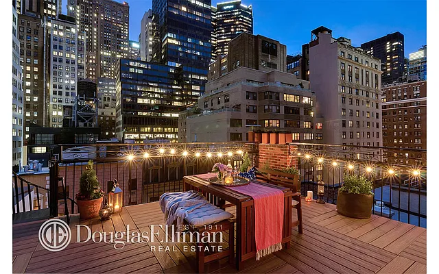 Sold by Douglas Elliman | media 13