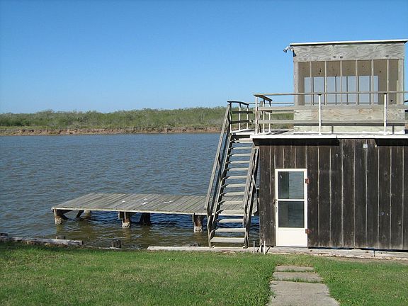 LIGHTED FISHING PIER, BOATHOUSE AND UPPER DECK