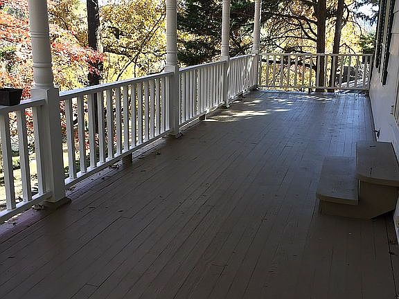 Porch spans length of home