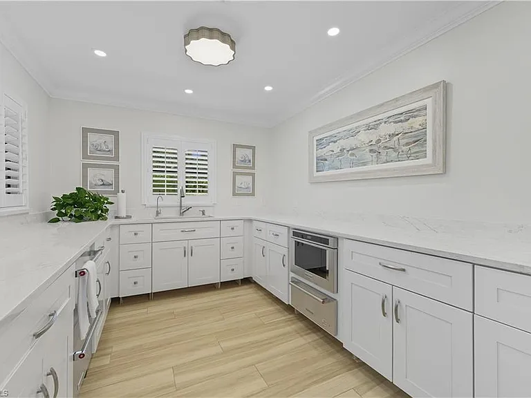 7040 Pelican Bay Blvd #D-401 — Photo 35