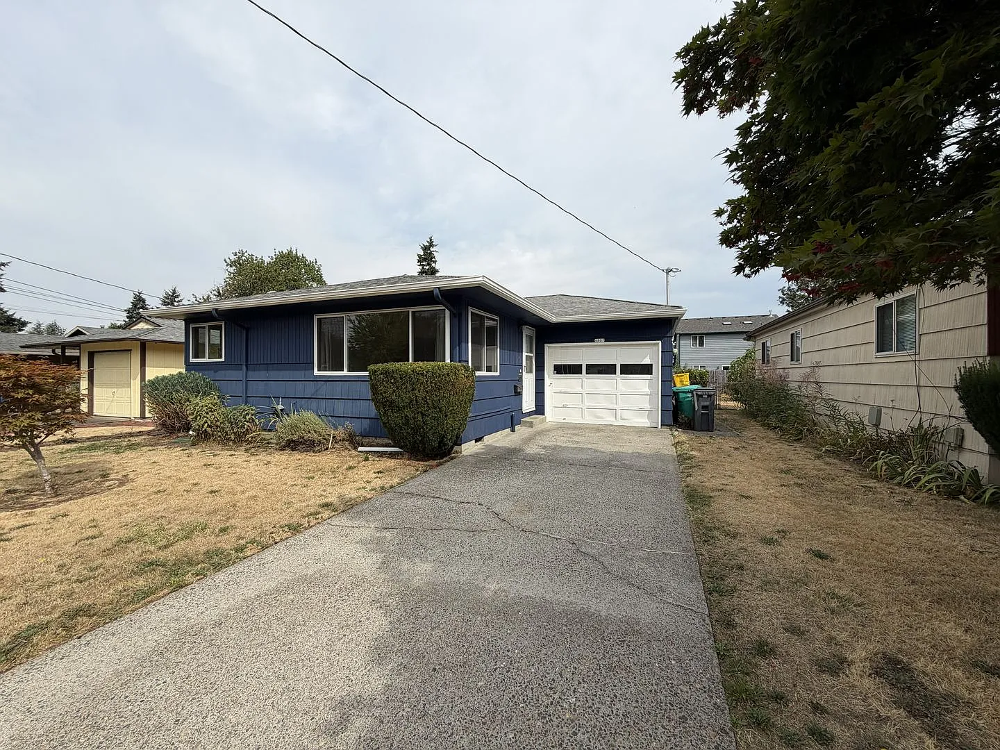 Charming Single-Level 2 Bedroom Home with Hardwood Floors, Spacious Kitchen, Attached Garage & Co... — Photo 2