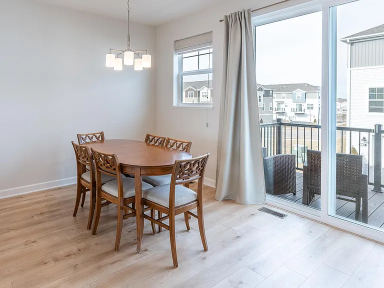 Dining Room located next to sliding glass door to deck