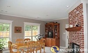 Breakfast area with 2 sided fireplace