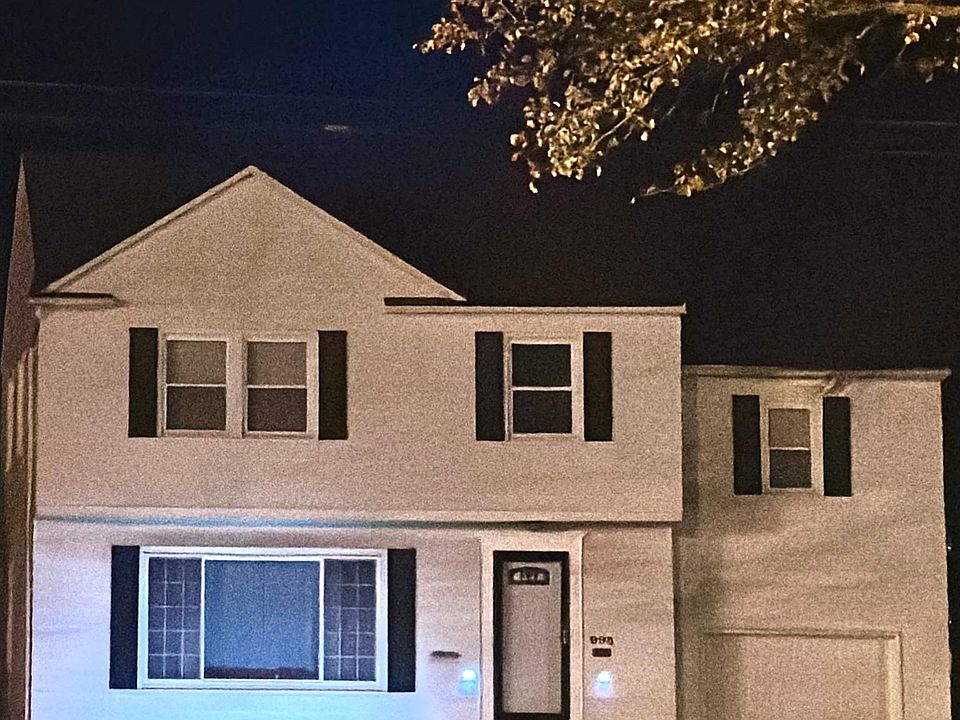 4 bedrooms 1.5 bath colonial with 1 car attached garage and ample driveway parking