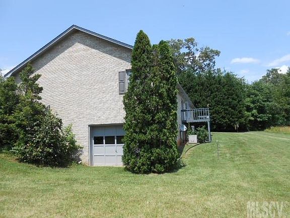 4th image of 712 Hillsfarm St NE