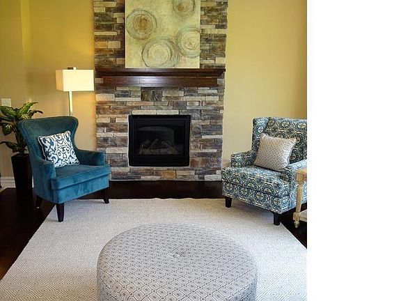 Gas fireplace with stone facing